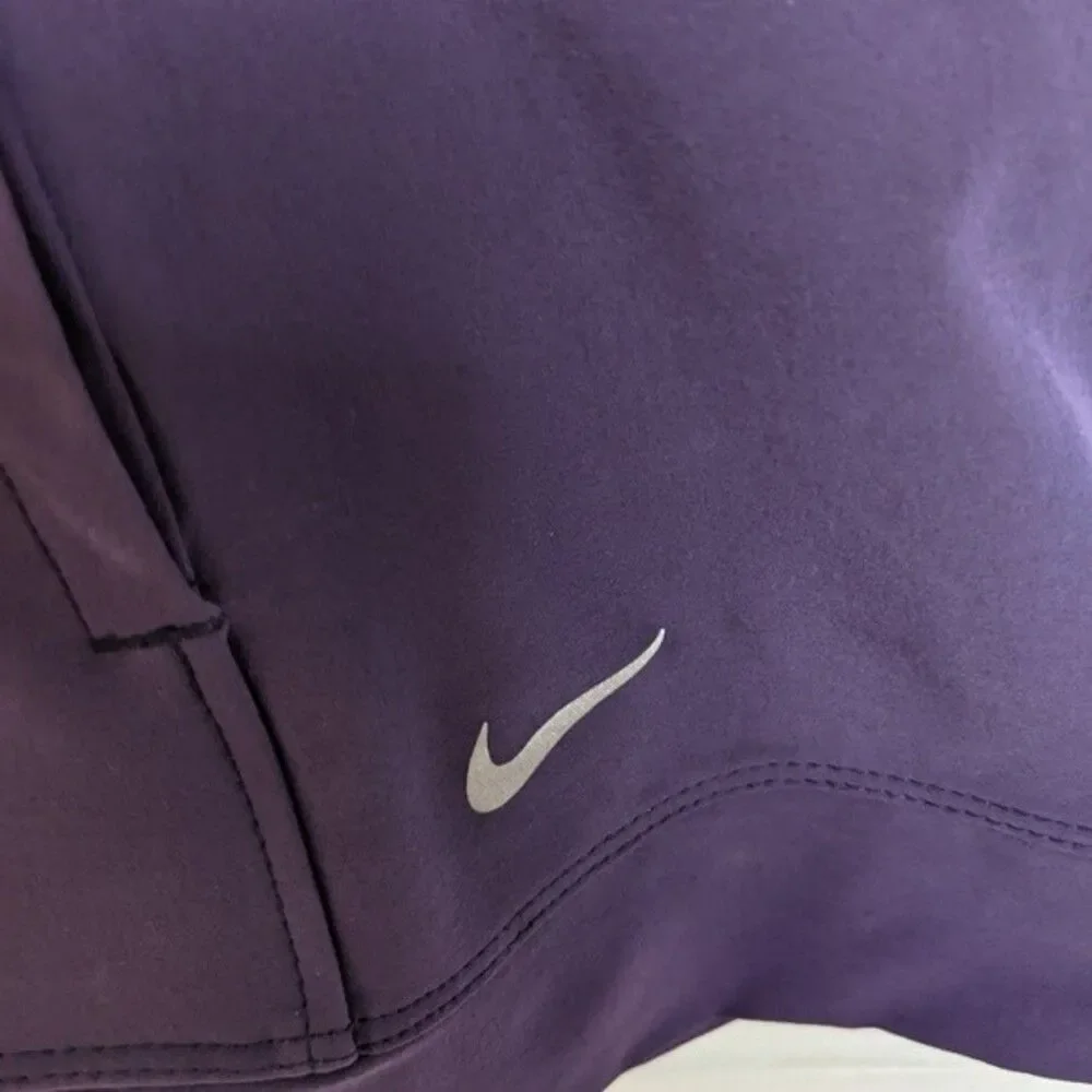 Nike Golf Tour Performance nikebetterworld.com purple half zip -L